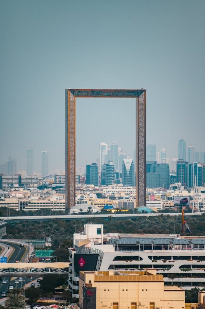 The iconic Dubai Frame set against the modern skyline of the city, showcasing unique architecture.